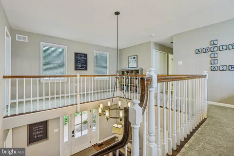 a view of living room and fireplace