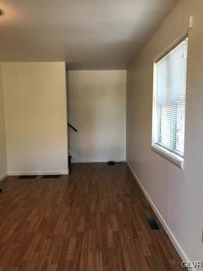 1538 East 8th Street, Unit A Bethlehem, PA 18015 - Photo 14 of 31 an empty room with wooden floor and windows
