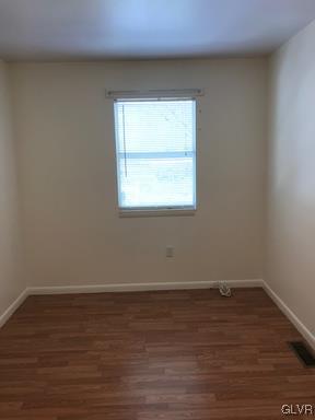 1538 East 8th Street, Unit A Bethlehem, PA 18015 - Photo 20 of 31 a view of a room that has wooden floor and a window