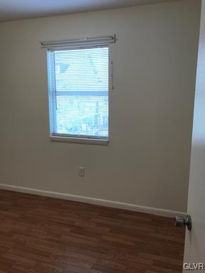 1538 East 8th Street, Unit A Bethlehem, PA 18015 - Photo 24 of 31 a view of an empty room with wooden floor and a window