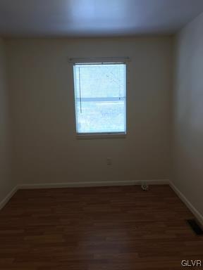 1538 East 8th Street, Unit A Bethlehem, PA 18015 - Photo 26 of 31 a view of a small space with wooden floor and a window