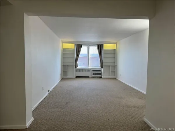 an empty room with a window