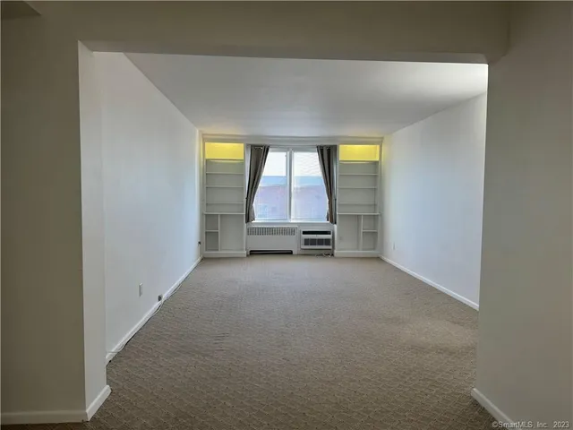 an empty room with a window