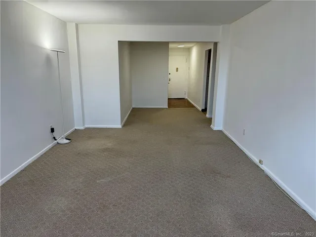 a view of a room with an empty space