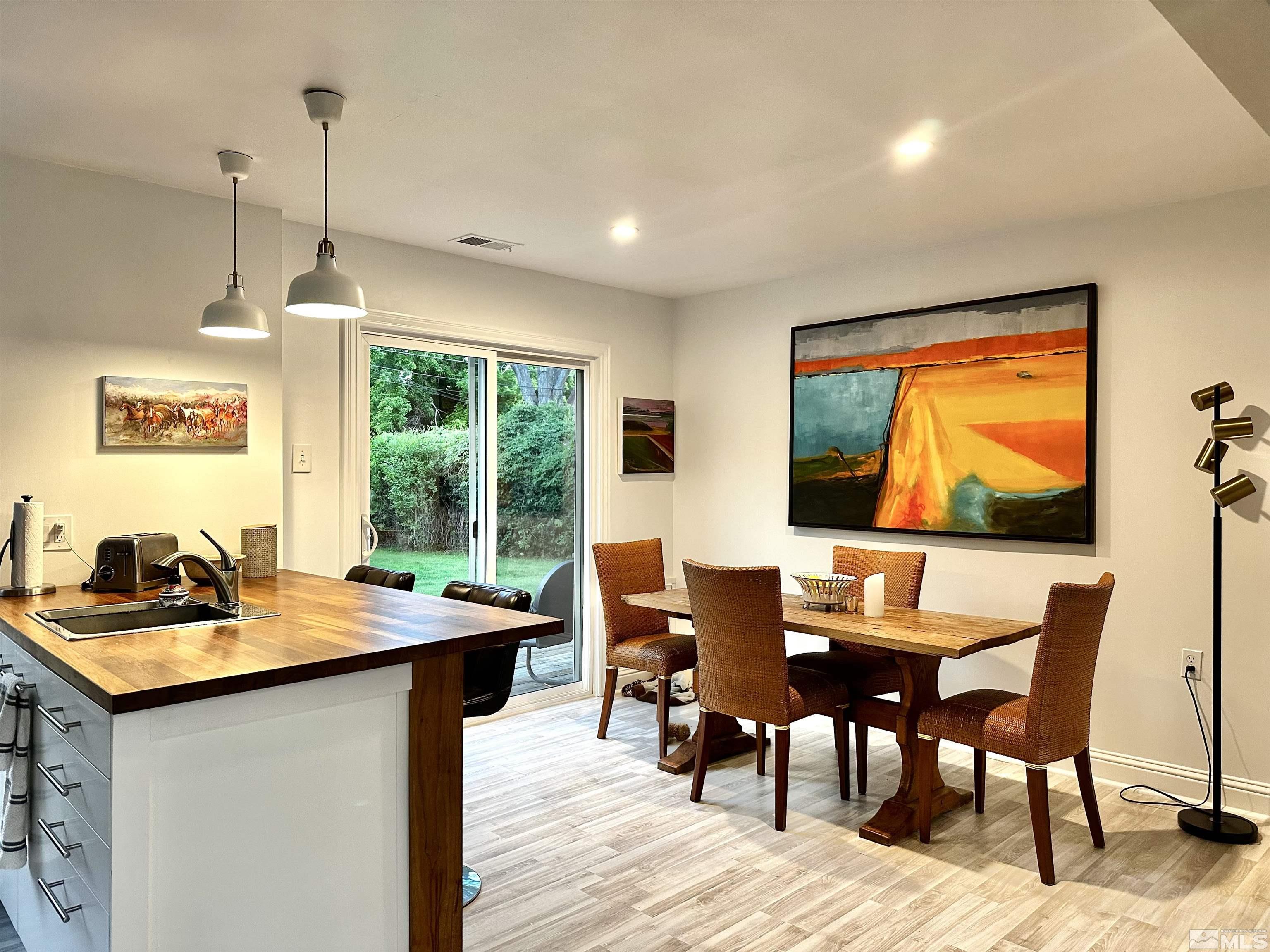 798 Broadway Boulevard Reno, NV 89502 - Photo 4 of 12 a view of a dining room with furniture window and outside view