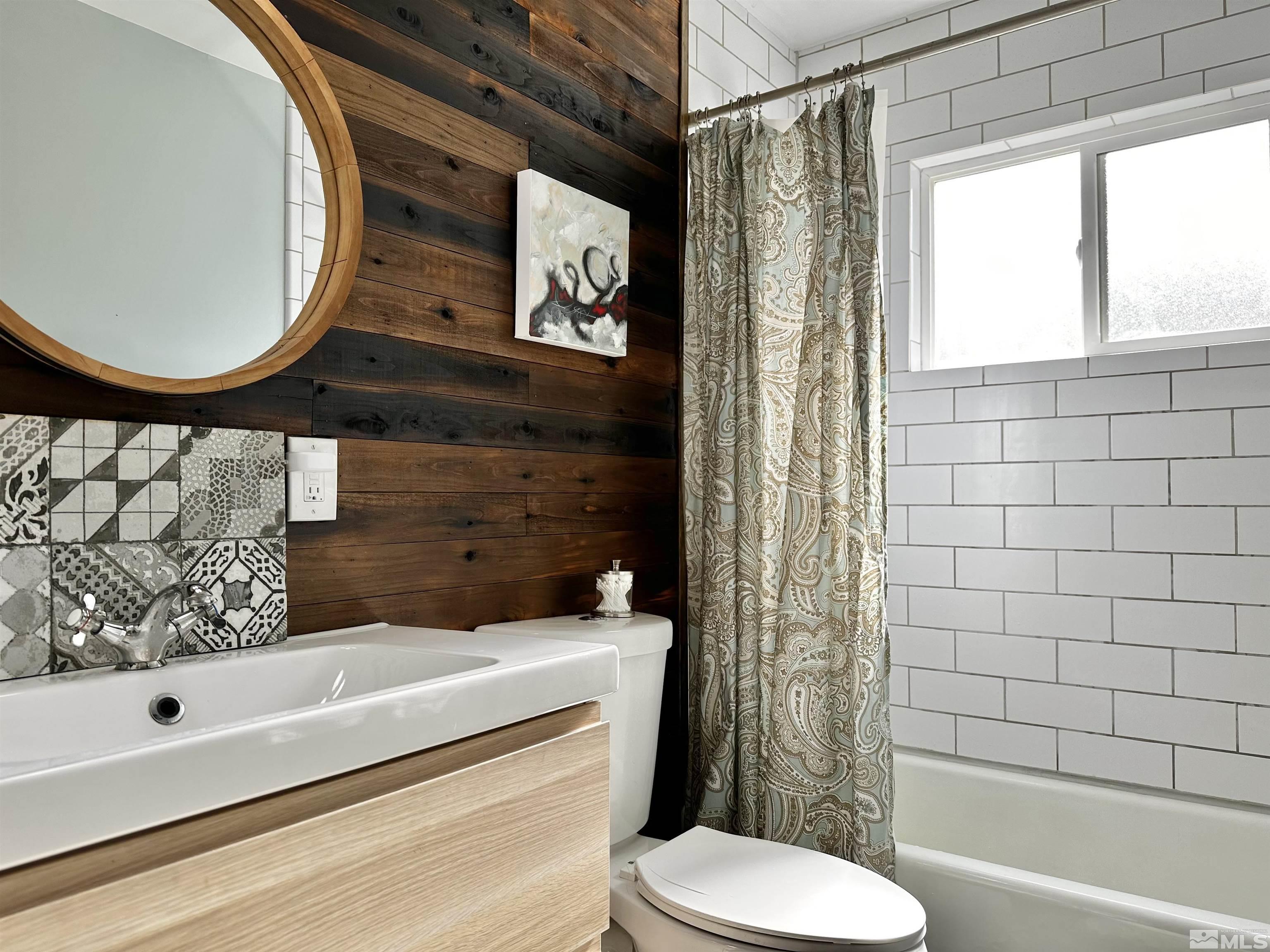 798 Broadway Boulevard Reno, NV 89502 - Photo 7 of 12 a bathroom with a sink toilet and shower