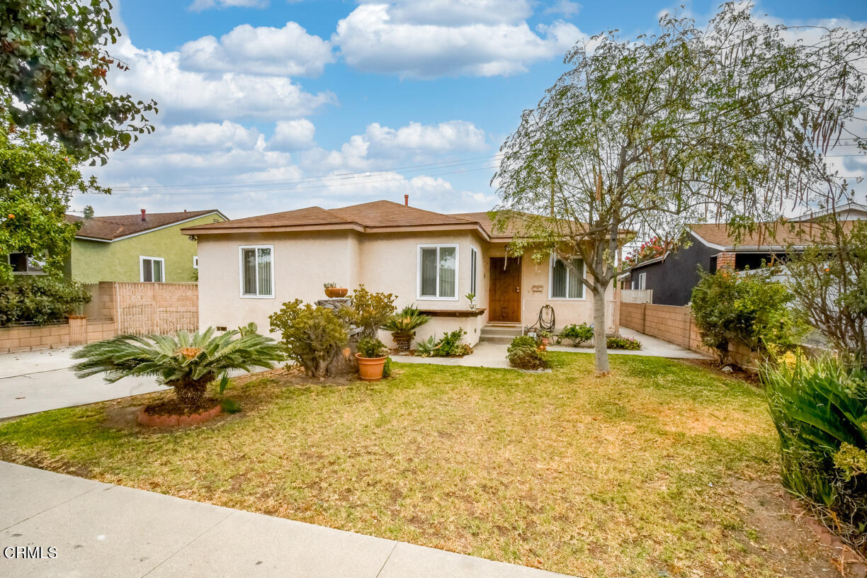 9533 Burma Road Pico Rivera, CA 90660 - Photo 17 of 17 a view of a house with swimming pool and sitting area