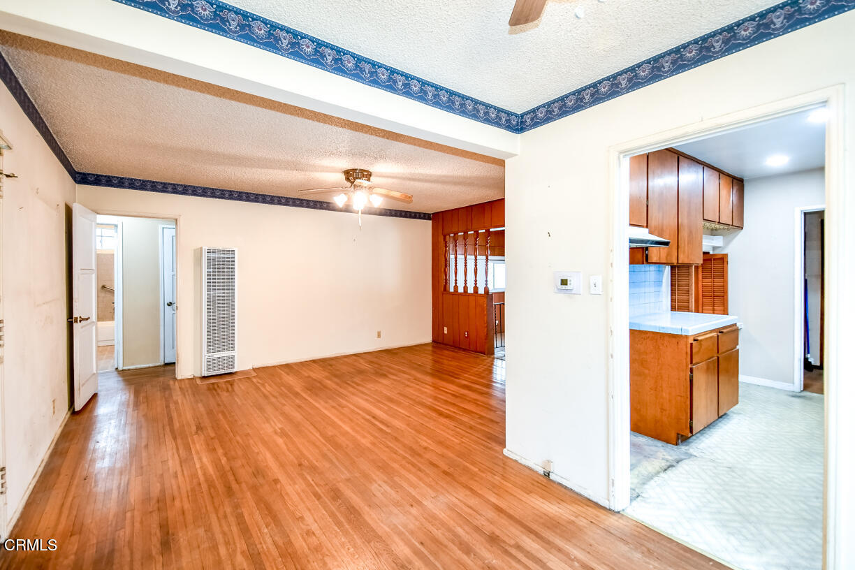 9533 Burma Road Pico Rivera, CA 90660 - Photo 4 of 17 a view of empty room with wooden floor