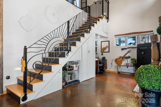 a view of entryway livingroom and hall