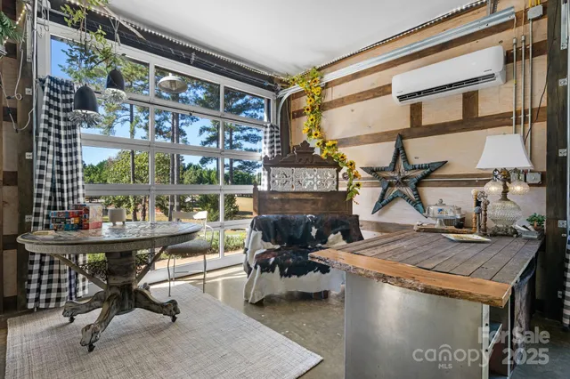 a view of a chairs and table in a patio