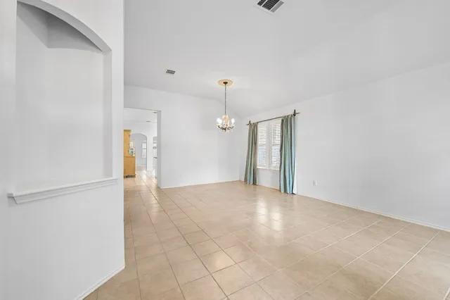 a view of an empty room with window