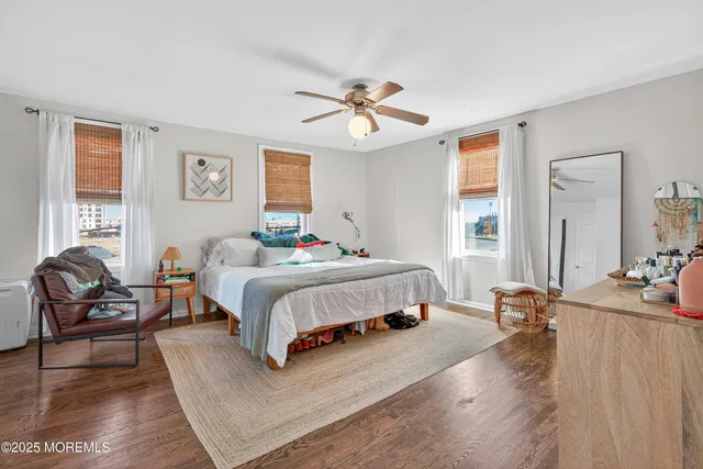 a bedroom with a bed and a view of bathroom