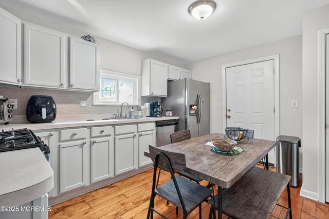 a view of a dining room with furniture