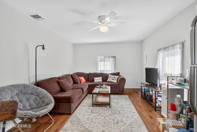 a kitchen with stainless steel appliances granite countertop a refrigerator stove a sink and dishwasher