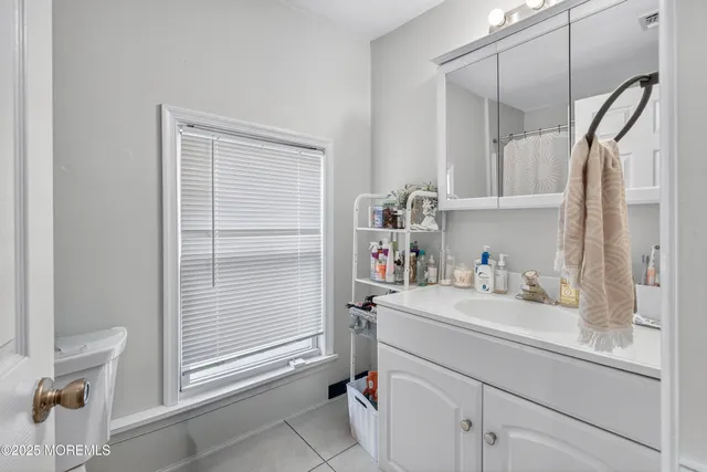 a view of a city with an ocean view