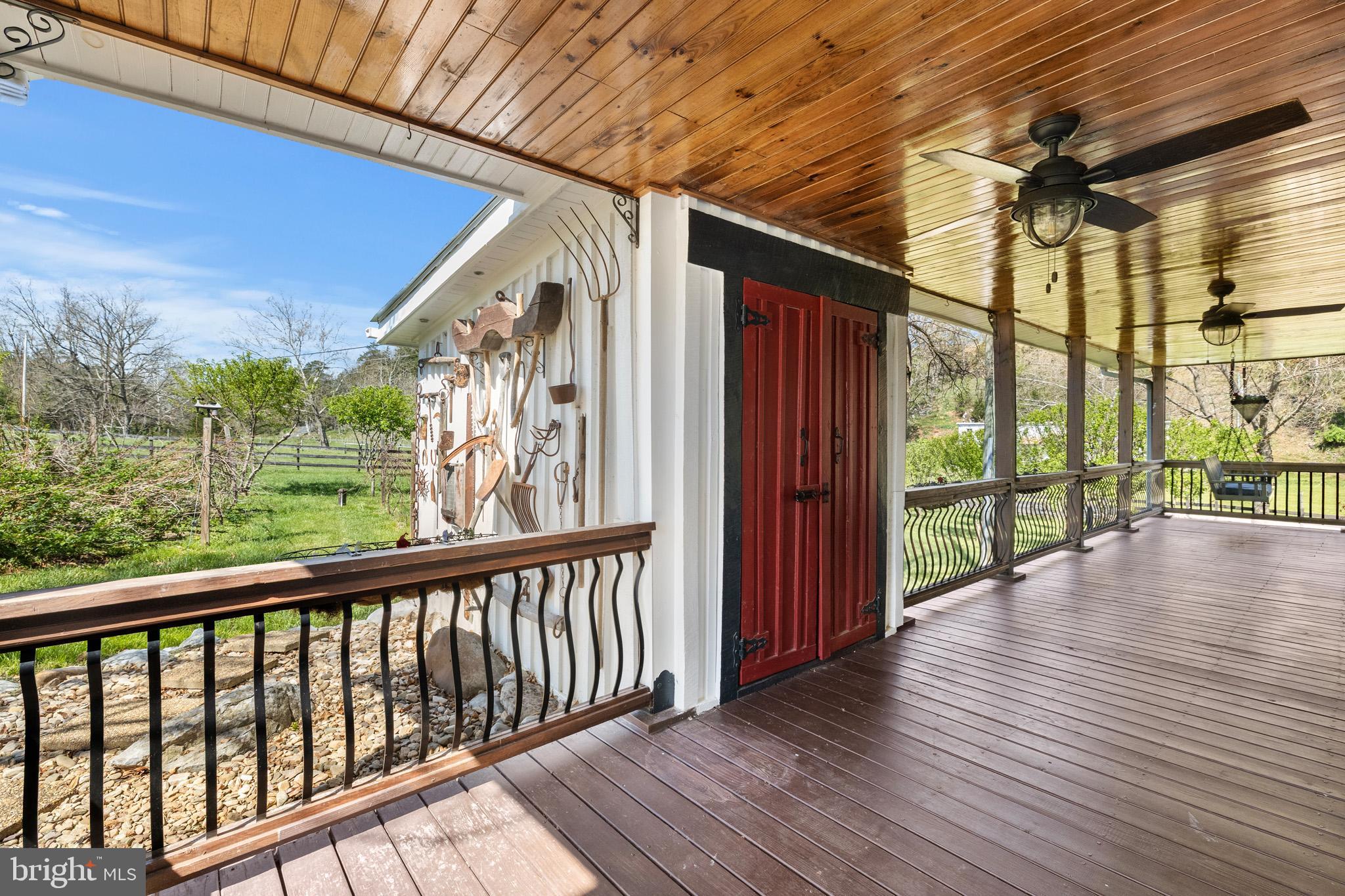 989 Swover Creek Road Edinburg, VA 22824 - Photo 82 of 132 a view of porch with wooden floor and outdoor space