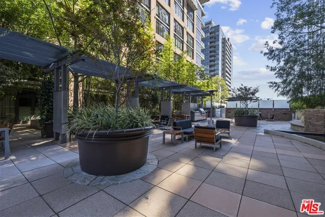 a building with sitting table and chairs