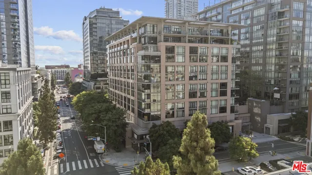 a view of a city with tall buildings