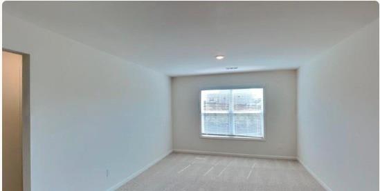 4610 Bramblett Grove Place Cumming, GA 30040 - Photo 15 of 20 an empty room with a window