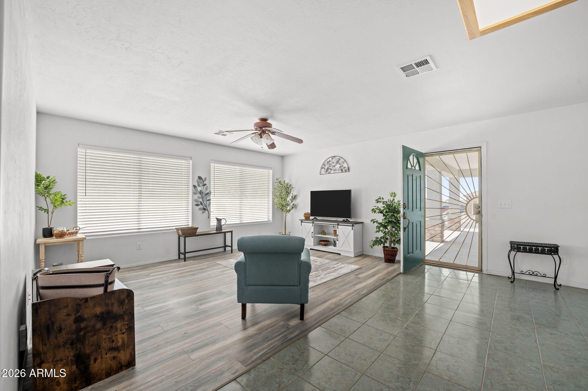 27144 Bennett Way Congress, AZ 85332 - Photo 5 of 33 a living room with furniture and a flat screen tv