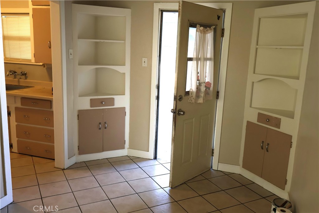 1311 6th Avenue Corning, CA 96021 - Photo 12 of 48 a view of a bathroom with a glass door
