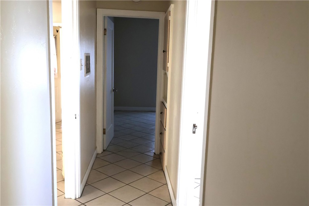 1311 6th Avenue Corning, CA 96021 - Photo 17 of 48 a view of a bathroom from a hallway