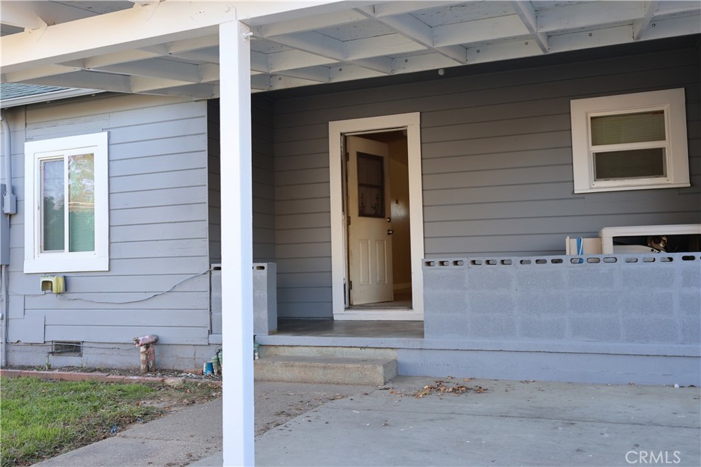 1311 6th Avenue Corning, CA 96021 - Photo 24 of 48 a front view of a house with a yard