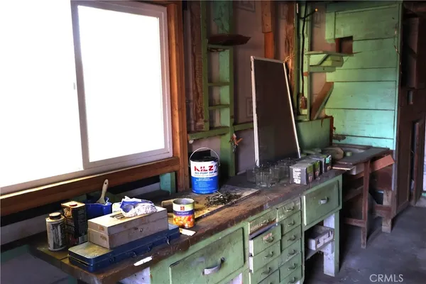 a room with furniture and a window