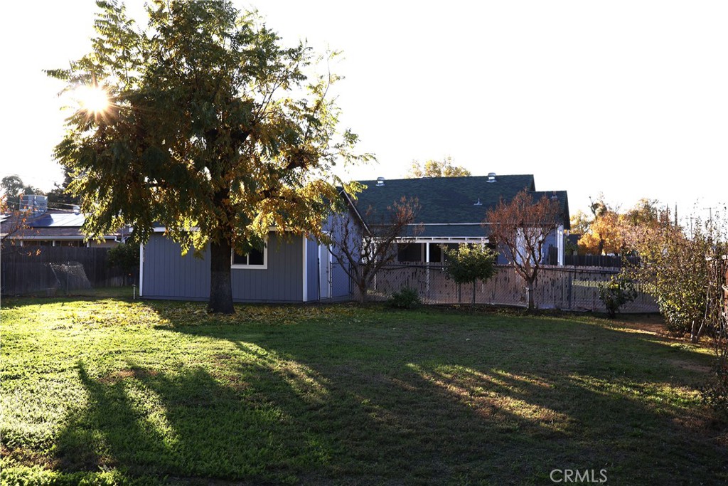 1311 6th Avenue Corning, CA 96021 - Photo 36 of 48 a view of a house with a yard