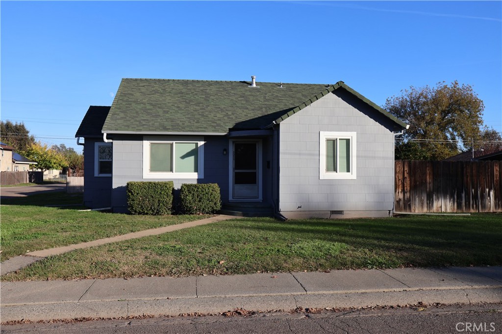 1311 6th Avenue Corning, CA 96021 - Photo 4 of 48 a view of a house with a yard