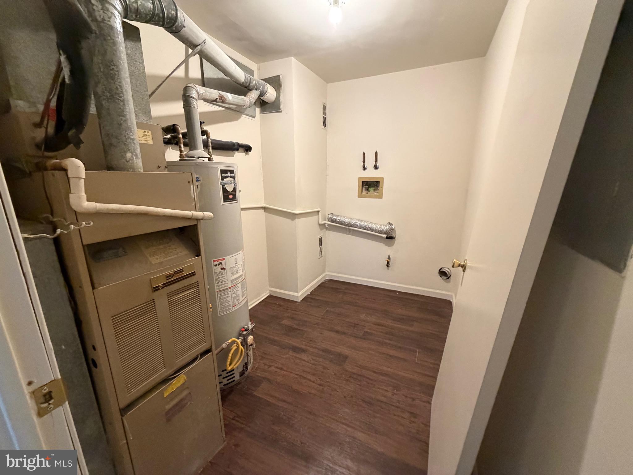 64 Mattix Run Absecon, NJ 08205 - Photo 12 of 14 a kitchen with a refrigerator and a stove
