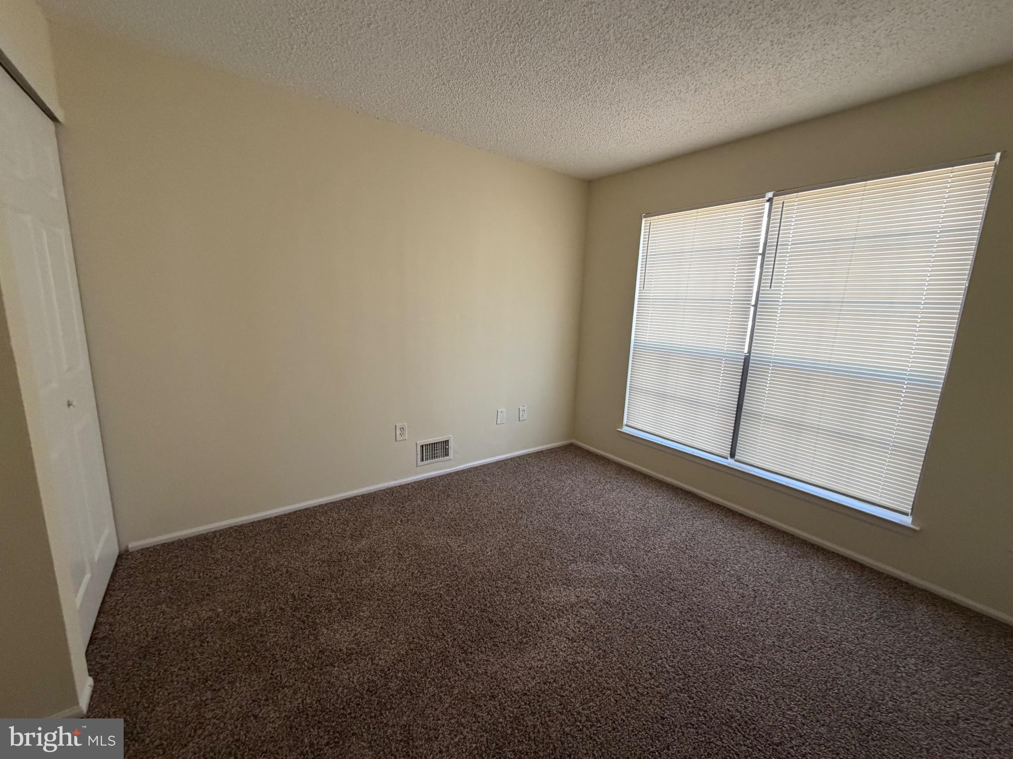 64 Mattix Run Absecon, NJ 08205 - Photo 13 of 14 an empty room with a window