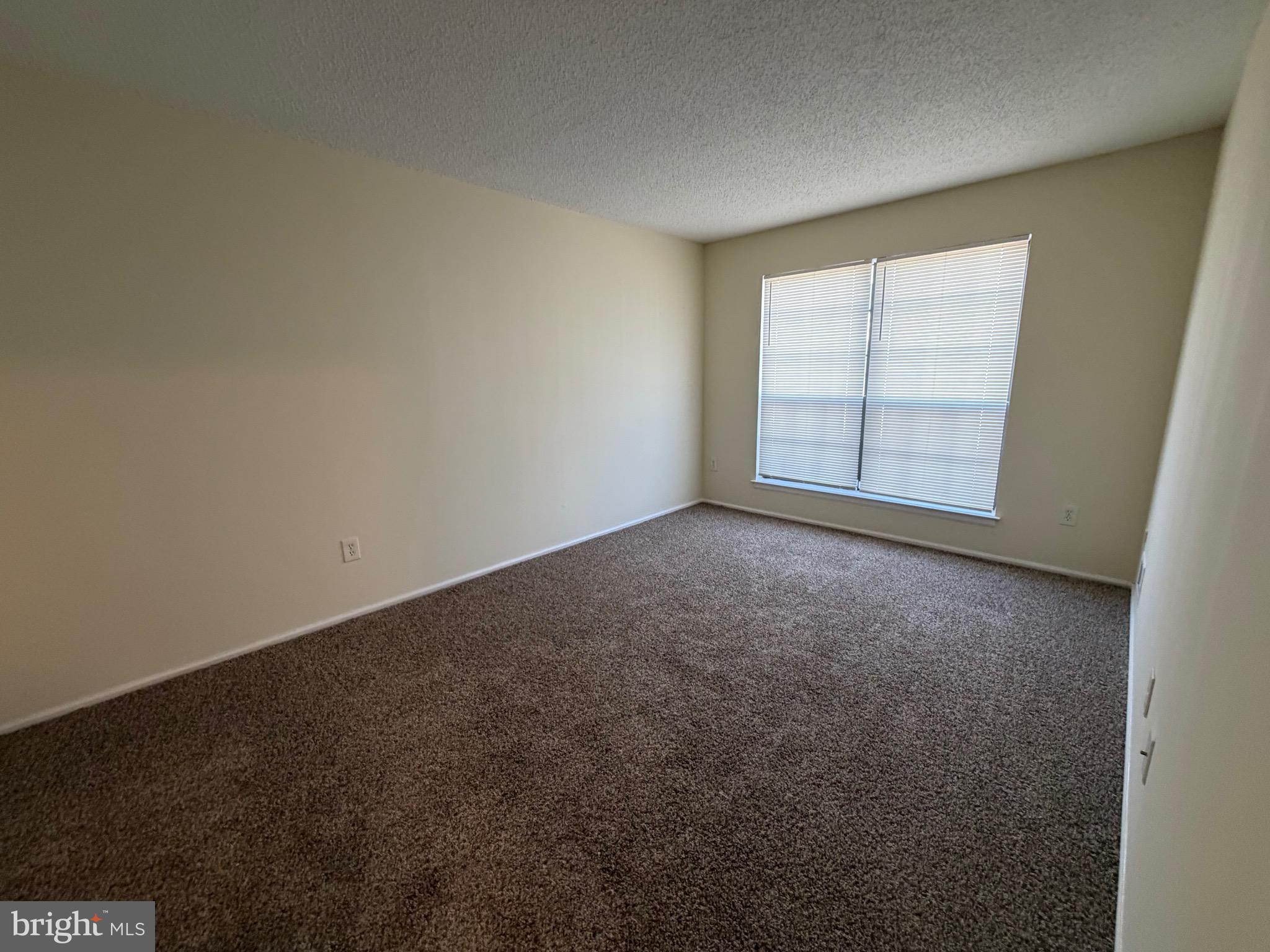 64 Mattix Run Absecon, NJ 08205 - Photo 9 of 14 an empty room with windows