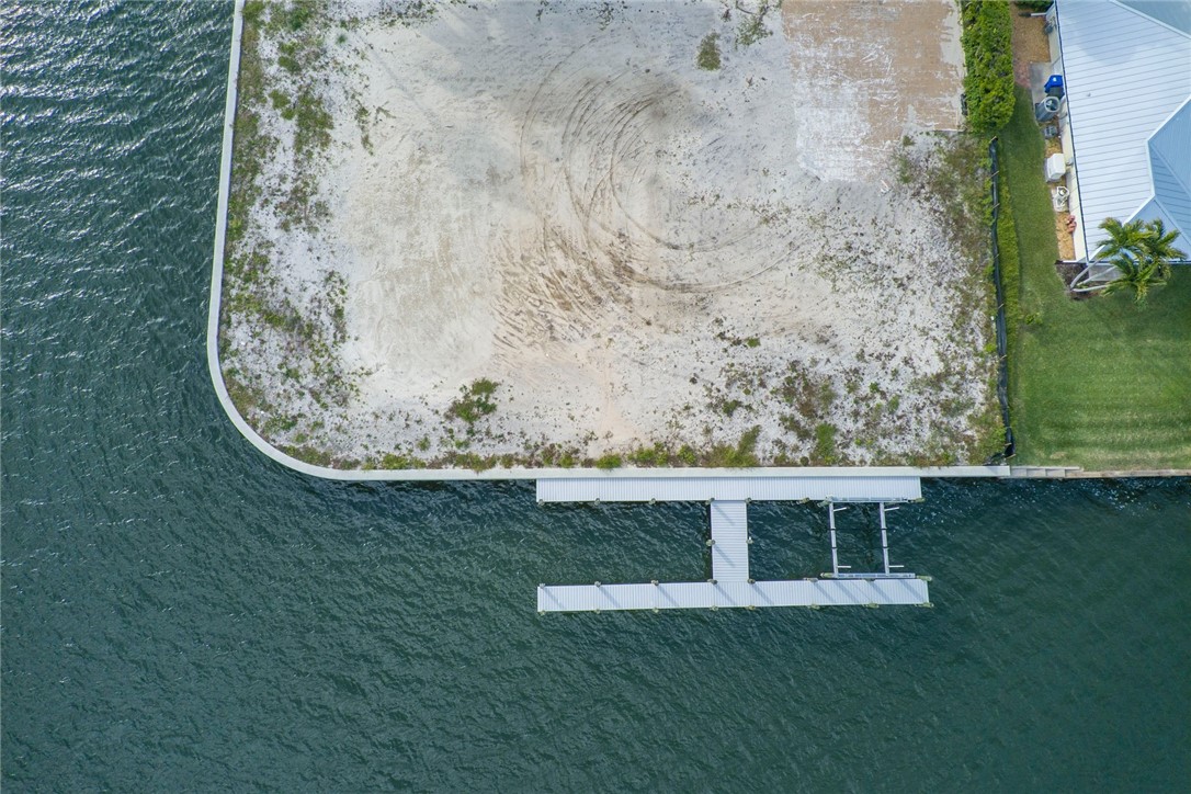 3 Sailfish Road Vero Beach, FL 32960 - Photo 14 of 17 a view of a wooden floor with a yard