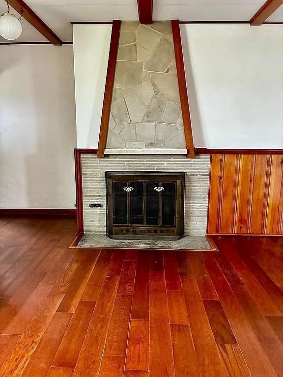 449 Race Street Waynesburg, PA 15370 - Photo 11 of 20 a view of empty room with wooden floor and fireplace