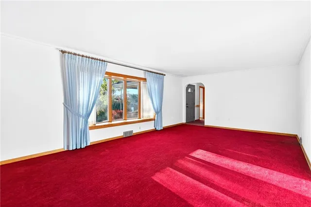 a view of an empty room with window