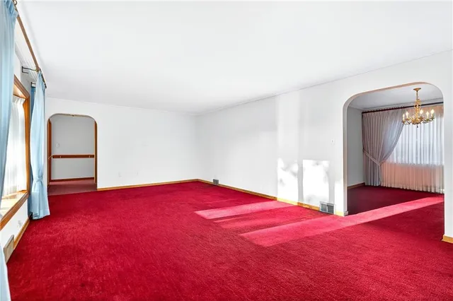 a view of empty room with front door