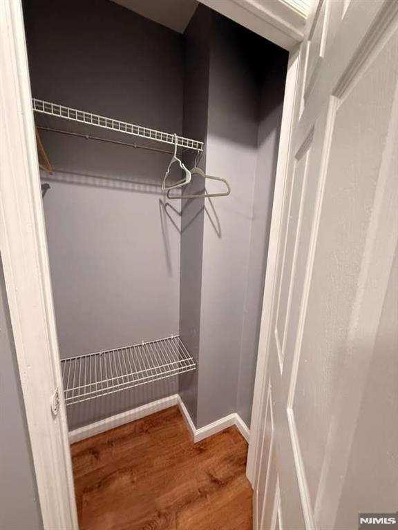 168 Grove Street Passaic, NJ 07055 - Photo 11 of 12 a view of small space with racks on the wall