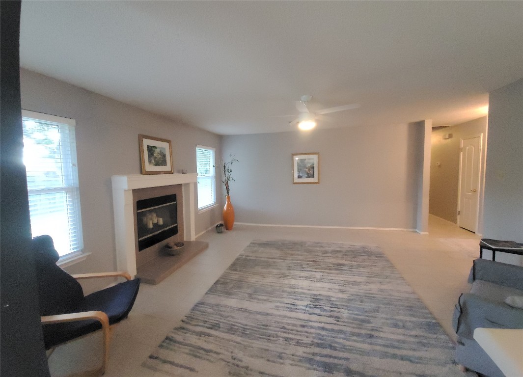 1805 Timber Ridge Drive Cedar Park, TX 78613 - Photo 11 of 25 a living room with furniture and a fireplace