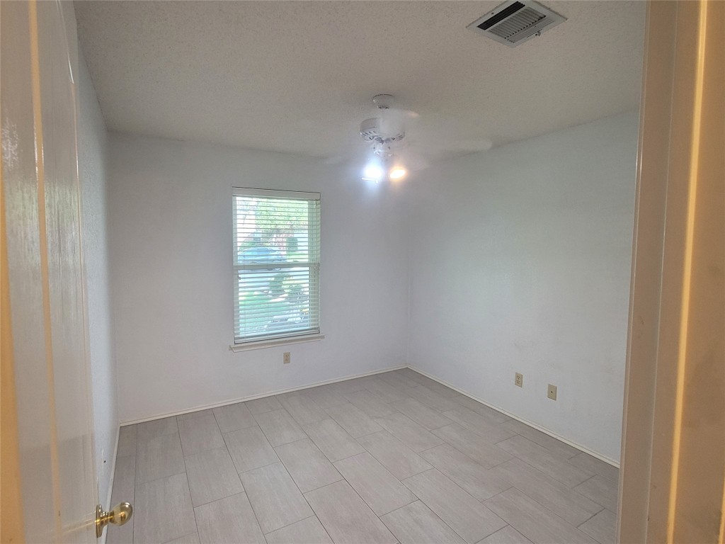 1805 Timber Ridge Drive Cedar Park, TX 78613 - Photo 14 of 25 an empty room with a window
