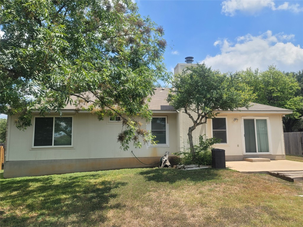 1805 Timber Ridge Drive Cedar Park, TX 78613 - Photo 9 of 25 front view of a house with a yard
