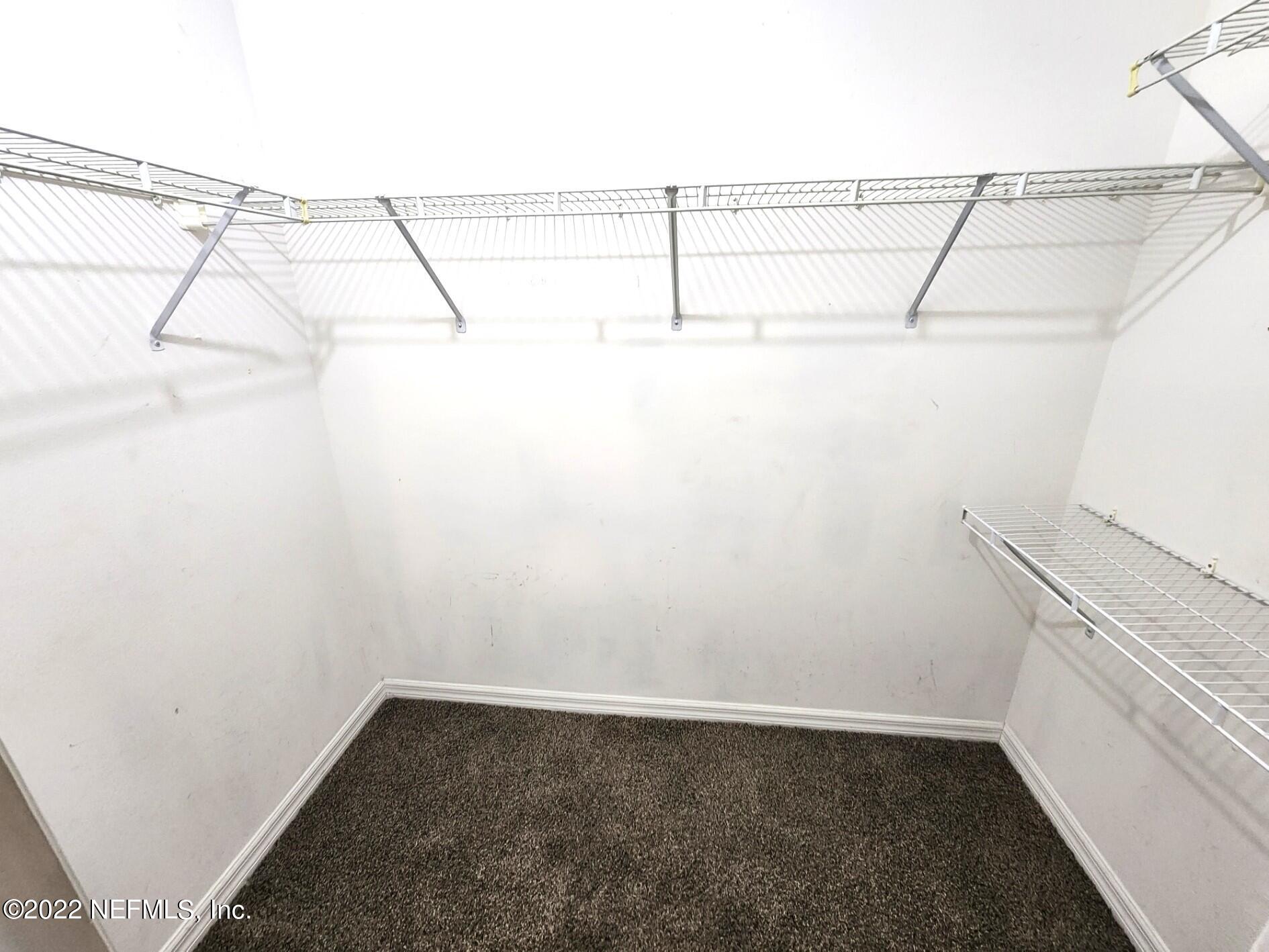 782 Bent Baum Road Jacksonville, FL 32205 - Photo 22 of 44 Master Bedroom walk-in closet