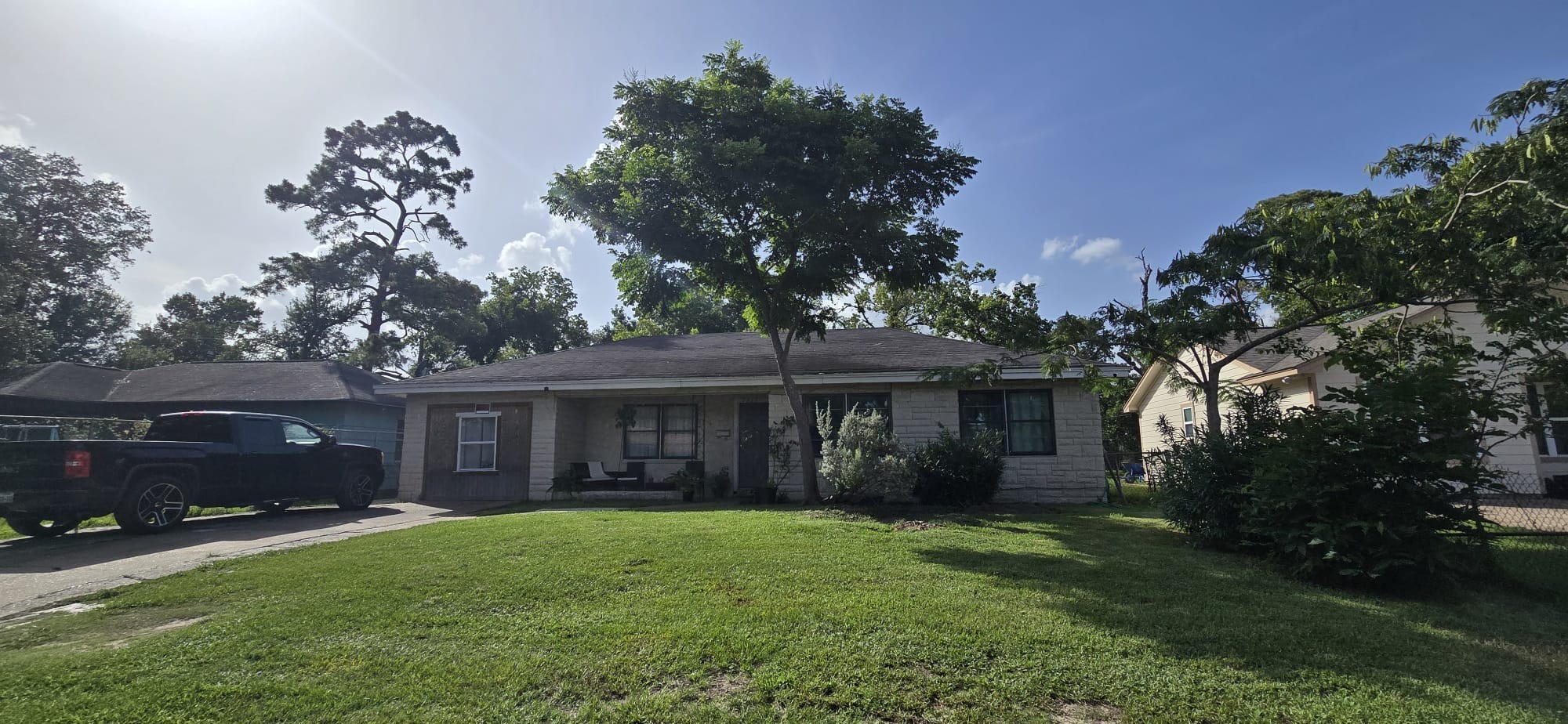 7317 Boggess Road Houston, TX 77016 - Photo 2 of 15 covered front porch and mature shade tress