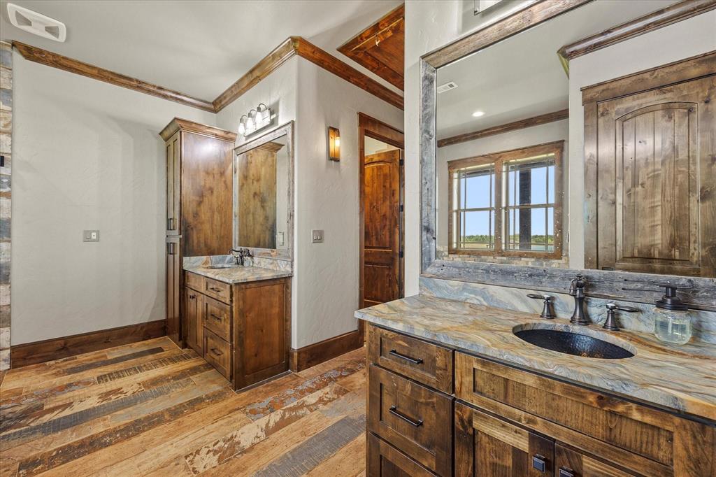 10641 County Road 632 Blue Ridge, TX 75424 - Photo 15 of 34 a bathroom with a sink double vanity and a mirror