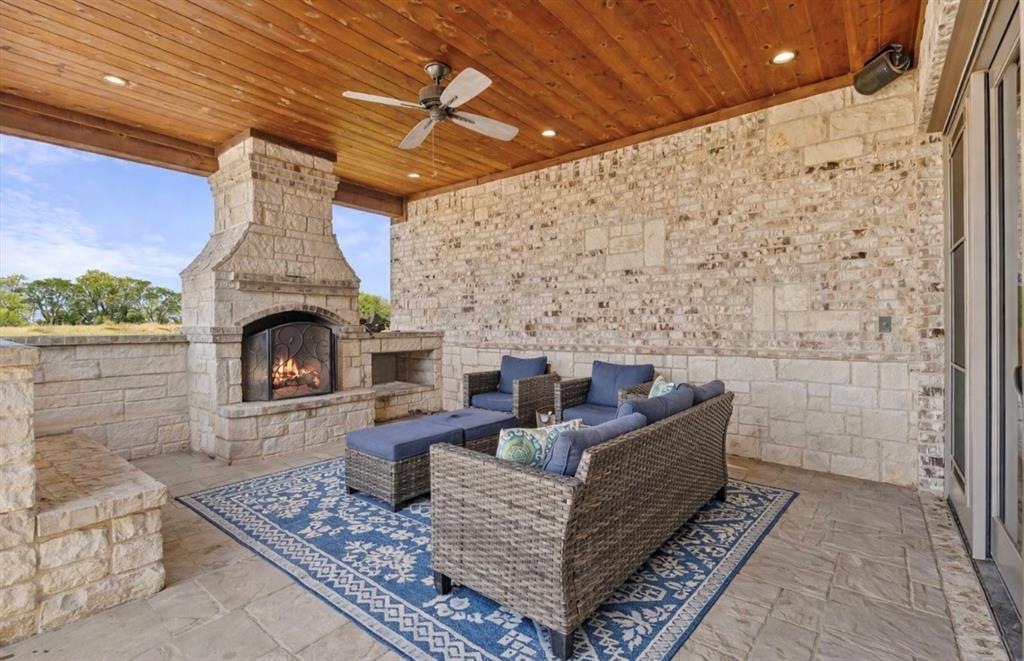 10641 County Road 632 Blue Ridge, TX 75424 - Photo 27 of 34 a living room with furniture and a fireplace