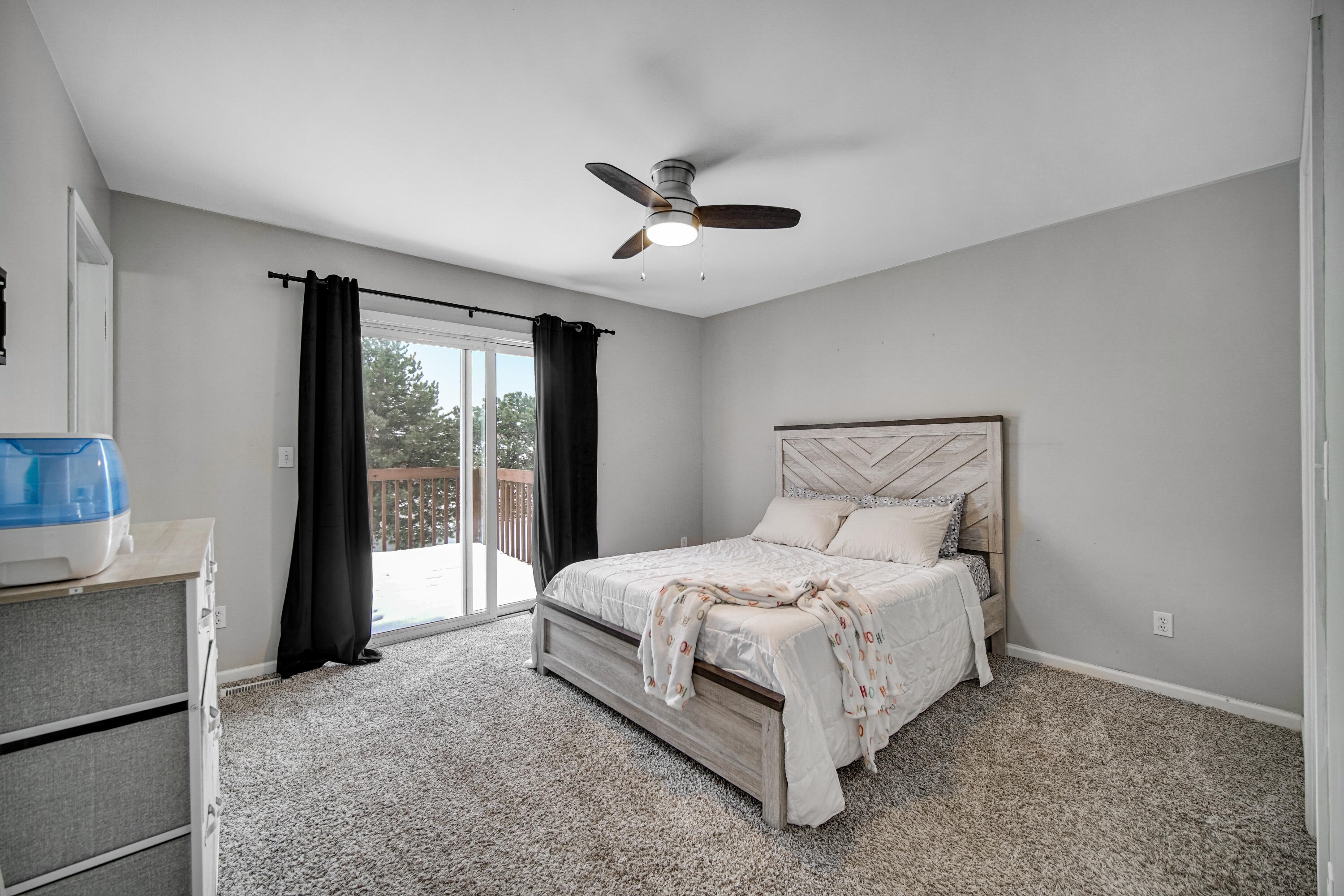 10487 Pinnacle Street Crown Point, IN 46307 - Photo 13 of 27 a spacious bedroom with a bed and a large window