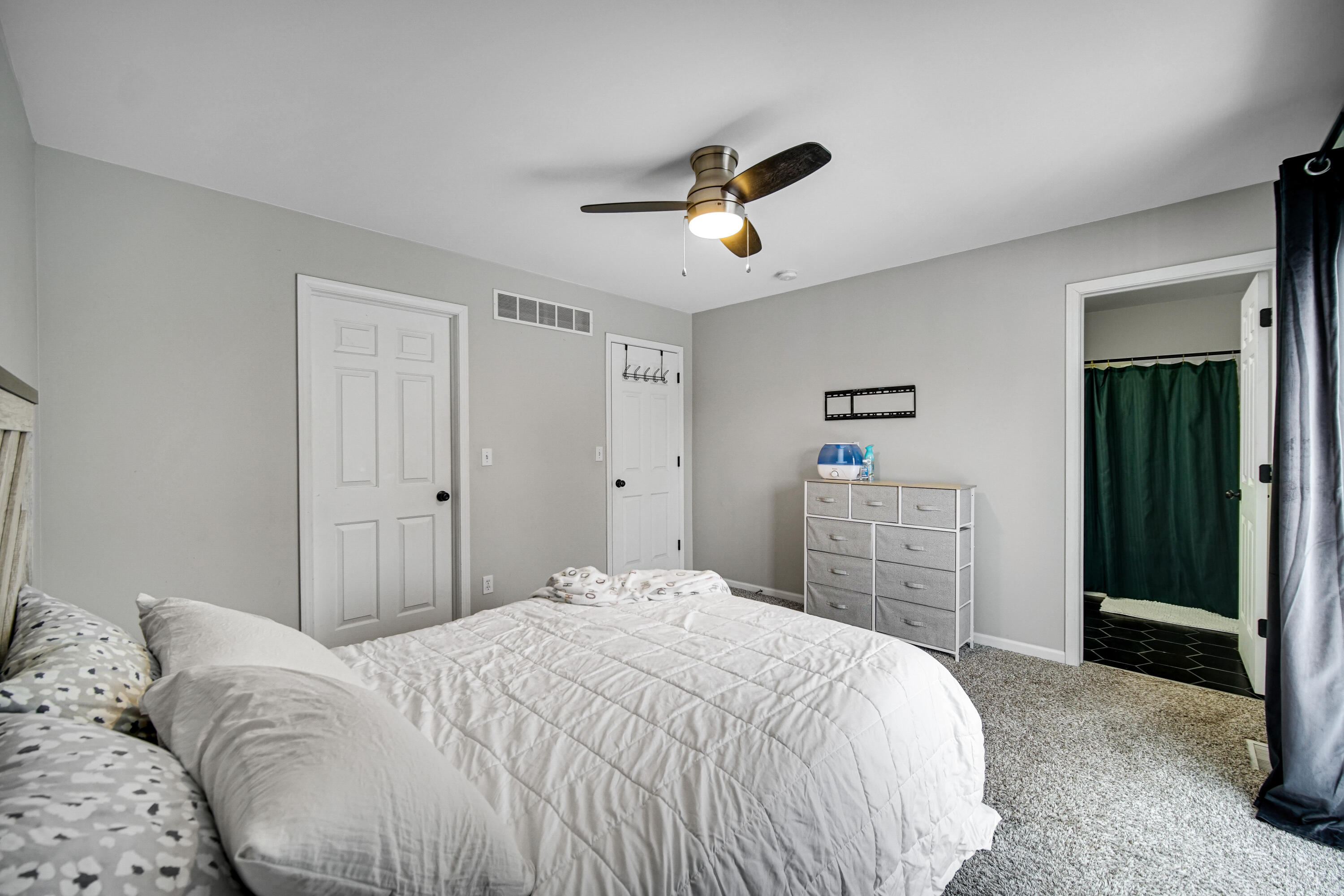10487 Pinnacle Street Crown Point, IN 46307 - Photo 14 of 27 a bedroom with a bed and a closet
