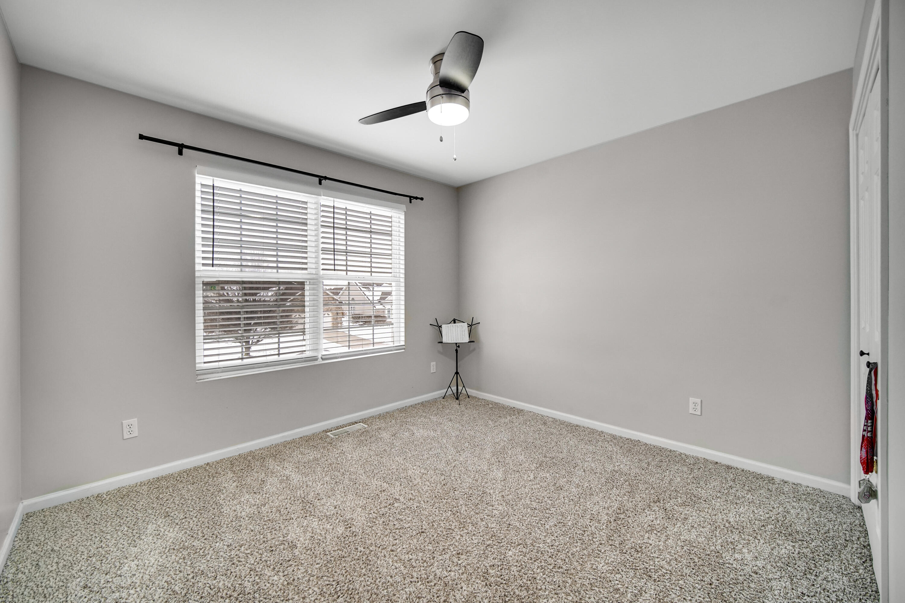 10487 Pinnacle Street Crown Point, IN 46307 - Photo 16 of 27 a view of an empty room with a window