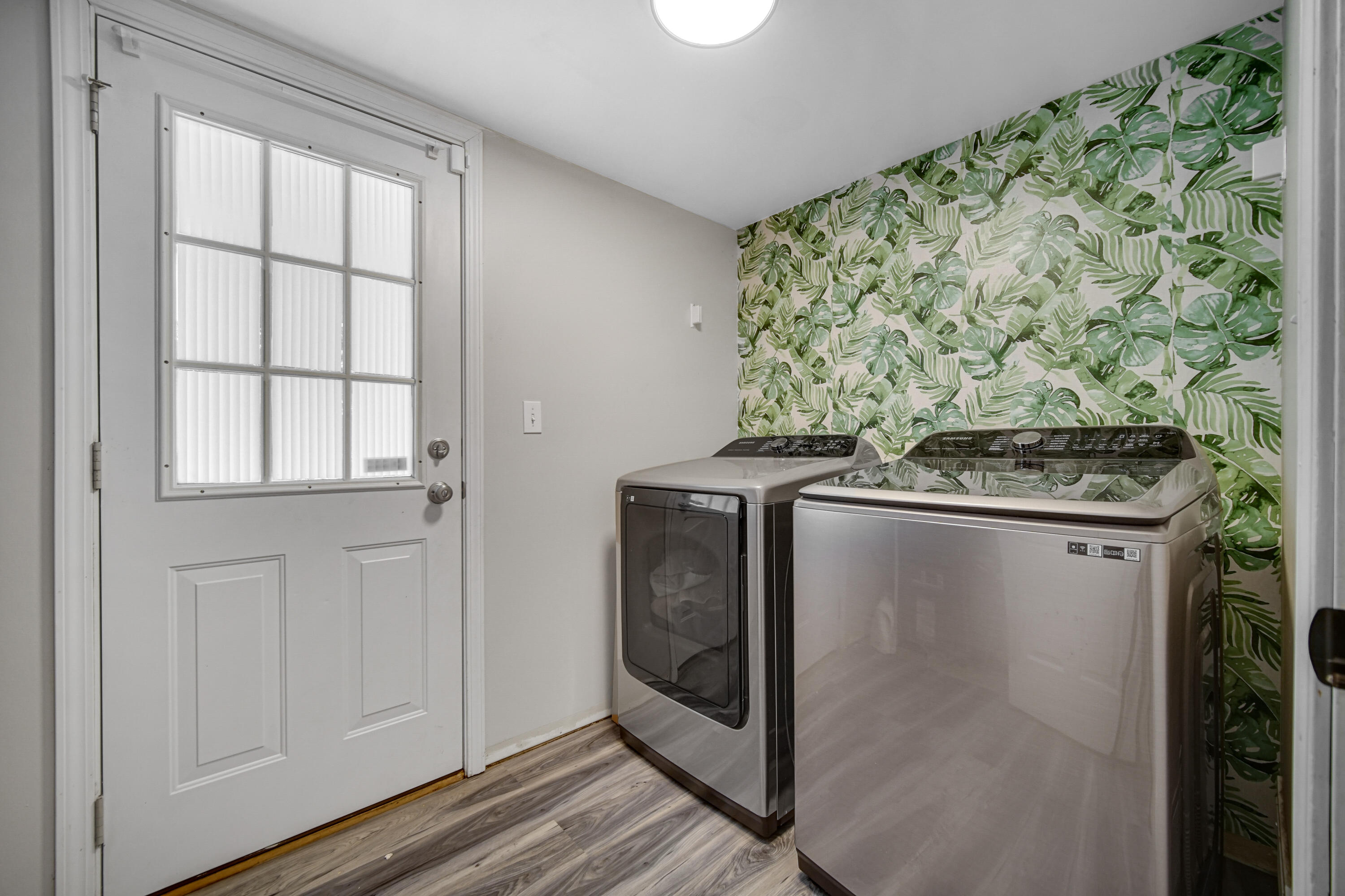 10487 Pinnacle Street Crown Point, IN 46307 - Photo 22 of 27 a view of a storage and utility room with washer and dryer