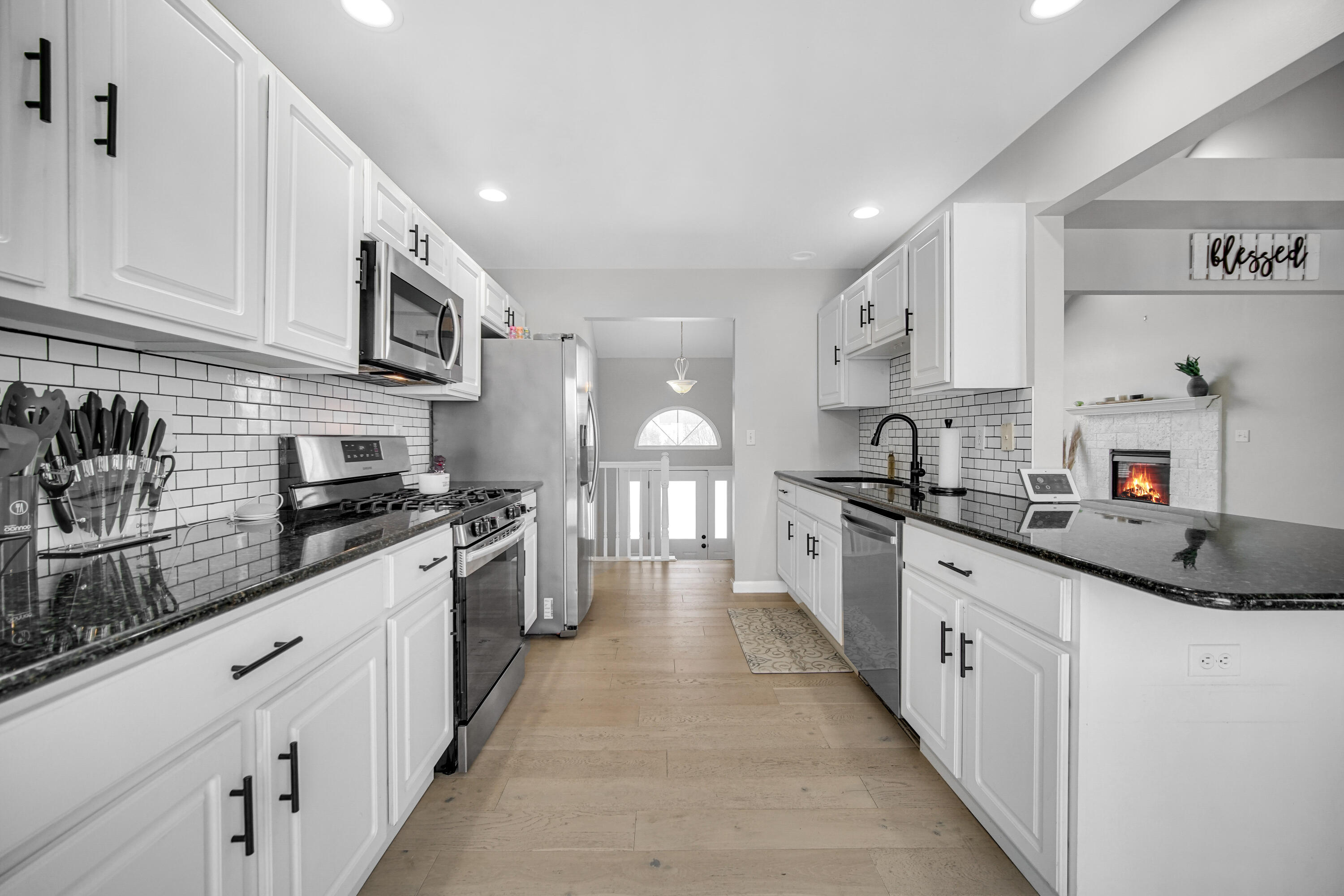 10487 Pinnacle Street Crown Point, IN 46307 - Photo 9 of 27 a large kitchen with stainless steel appliances lots of counter top space